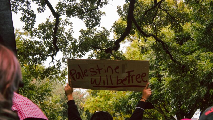 Protest sign that reads "Palestine with be free"